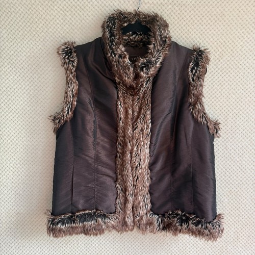 Per una faux - fur, gilet